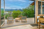 Relax after a day of adventure on the patio with incredible views of Big Mountain.